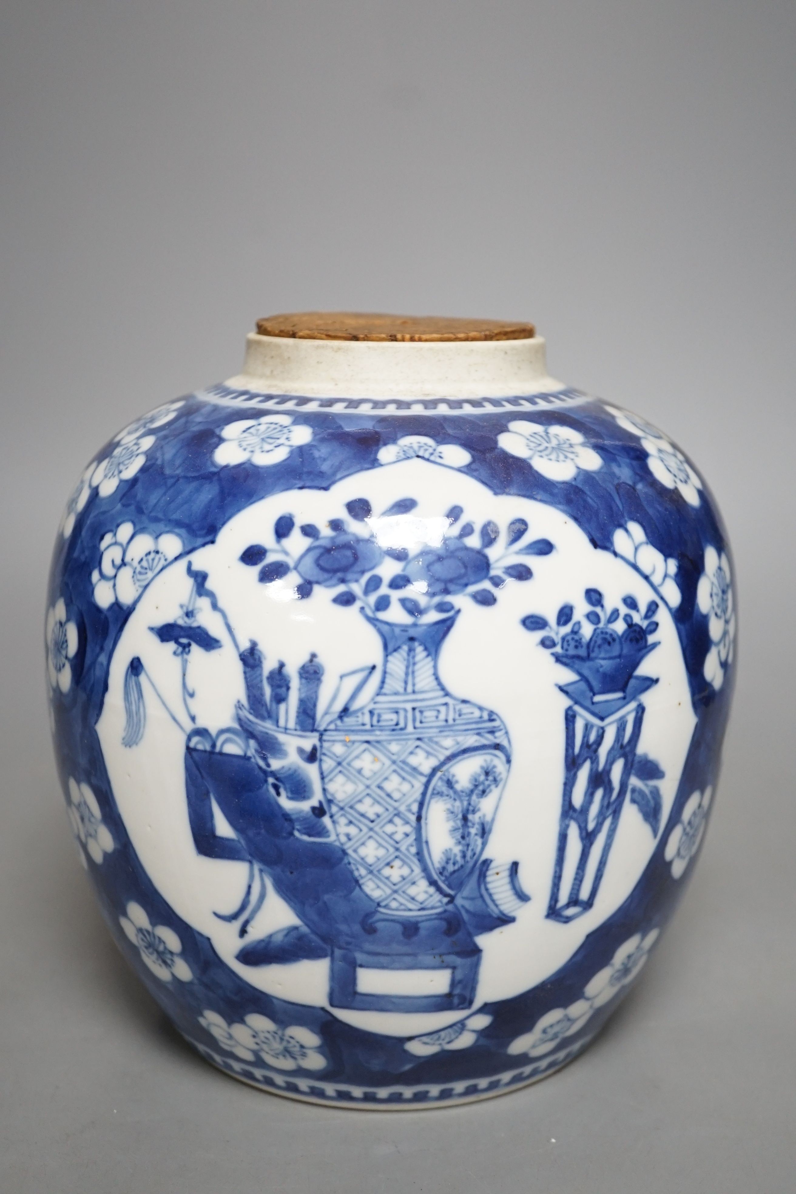 A 19th century Chinese blue and white ginger jar and cover - 20.5cm tall